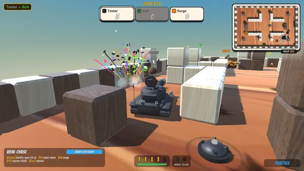 A burst of colorful confetti just past a dark gray tank in chase view, with an orange tank in the distance and a bomb on the floor